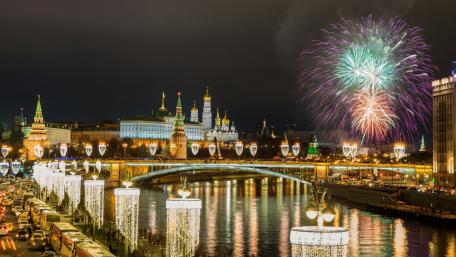 Magical Night in the City Under Fireworks Display wallpaper