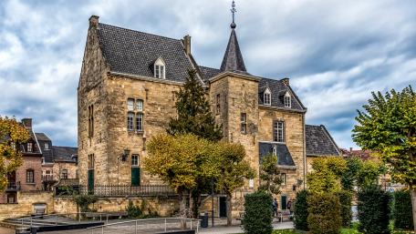 Charming Urban Architecture Under Dramatic Sky wallpaper