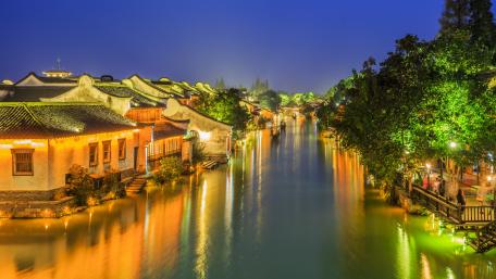 Serene Nightscape of a River City wallpaper