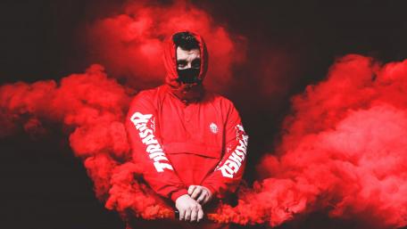 Intense Red Smoke and Masked Figure Wallpaper wallpaper