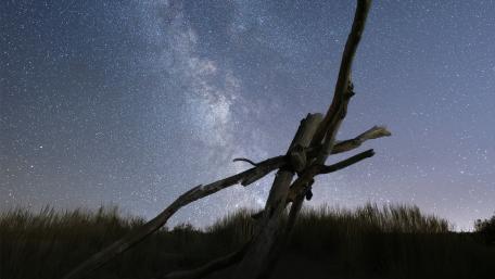 Majestic Milky Way Over a Deserted Landscape wallpaper