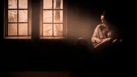 Sad woman in the darkness wallpaper
