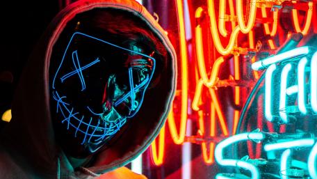 Neon Mischief in the Nighttime Cityscape wallpaper