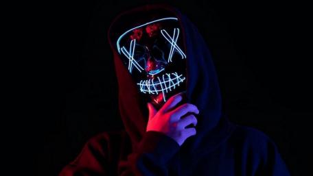 Neon Masked Mystery Awaits wallpaper