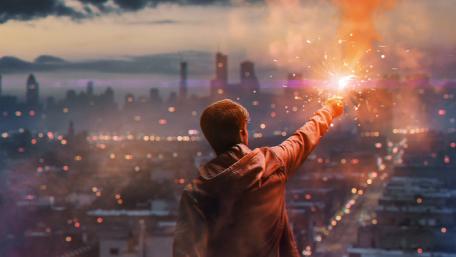 Guy on the top of a building wallpaper