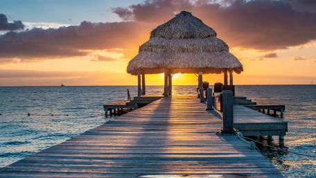 Sunset from a tropical pier wallpaper