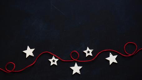 Red Stars on Dark Background Wallpaper wallpaper