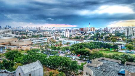 Skyline of the cityscape with storm brewing in Tel-Aviv, Israel. wallpaper
