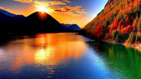 Autumn Sunset Over Serene Lake and Mountains wallpaper
