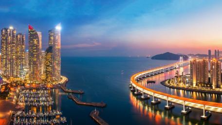 Vibrant Cityscape at Dusk with Skyscrapers and Lights wallpaper