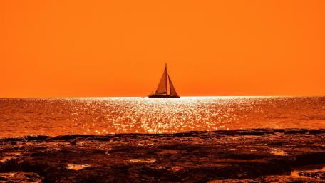 Golden Sunset Sailboat Serenity wallpaper