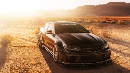 Sleek Mercedes Dreamcar in Desert Sunset Light wallpaper