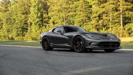 Sleek Black Dodge Viper on the Road wallpaper