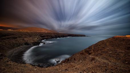 Serene Coastal Nightscape Captured in Time wallpaper