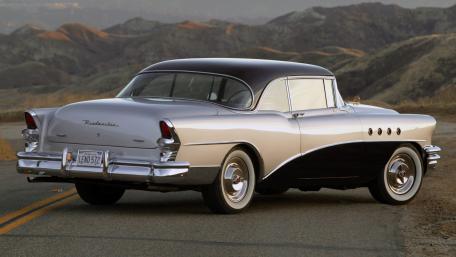 Classic Buick Roadmaster on Open Road for Car Enthusiasts wallpaper