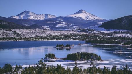 Winter Serenity Over Mountain Lake View wallpaper