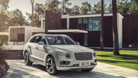 Luxury Bentley SUV in a Modern Setting wallpaper