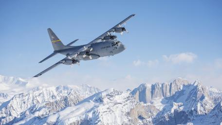 Soaring High Above Snowy Peaks wallpaper