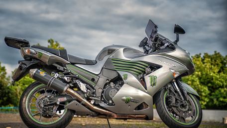 Sleek Kawasaki Motorcycle with Monster Energy Design wallpaper