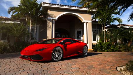 Red Lamborghini Huracan in a Luxurious Setting wallpaper