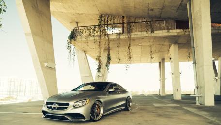 Sleek Mercedes-Benz Coupe in Urban Setting wallpaper