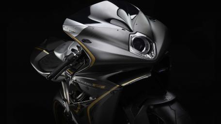 Sleek Motorcycle Design in Dark Setting wallpaper