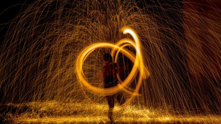 Whirling Sparks of Light in Motion wallpaper