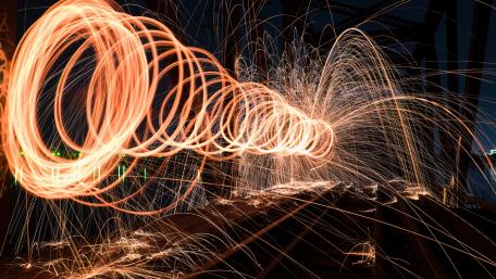 Energetic Light Trails Unveiled in Motion wallpaper