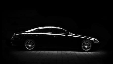 Sleek Black Beauty in Shadows wallpaper