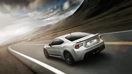 Sleek Toyota GT on a Scenic Road Trip wallpaper