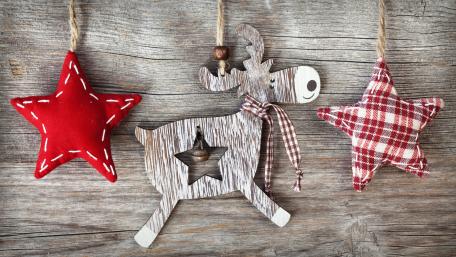 Rustic Christmas Charm: Stars and Reindeer Wall Decor wallpaper