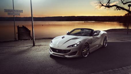 Elegant Ferrari Portofino by the Serene Lake wallpaper