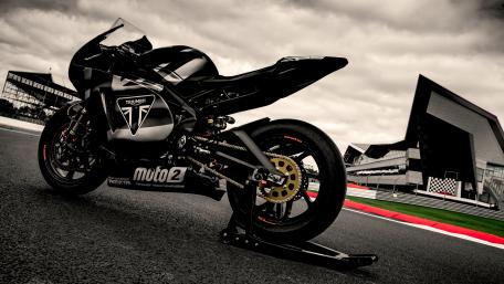 Sleek Black Triumph Motorcycle Wallpaper wallpaper