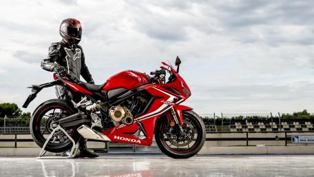 Dynamic Honda Motorcycle in Action wallpaper