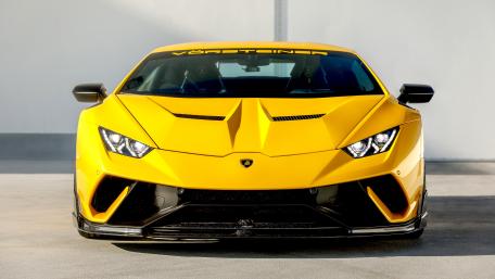 Vibrant Yellow Sports Car Wallpaper wallpaper
