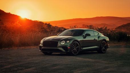 Sleek Elegance of the Bentley Continental GT V8 Coupe at Sunset wallpaper