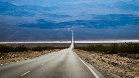 Endless Road Through Scenic Mountains wallpaper