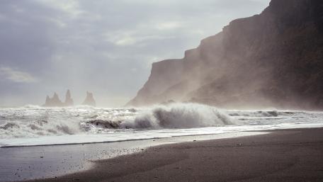 Majestic Shoreline with Sea Stacks and Waves wallpaper