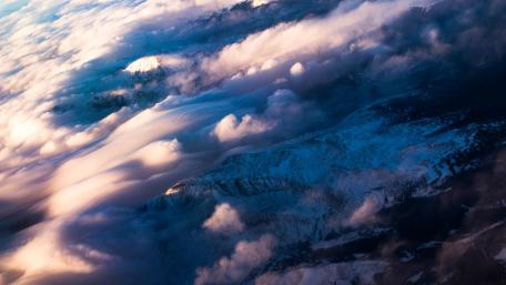 Majestic Mountain Clouds Above Peaks wallpaper
