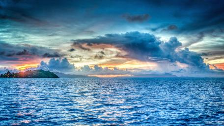 Spectacular Cloudy Island Seascape in 5K wallpaper