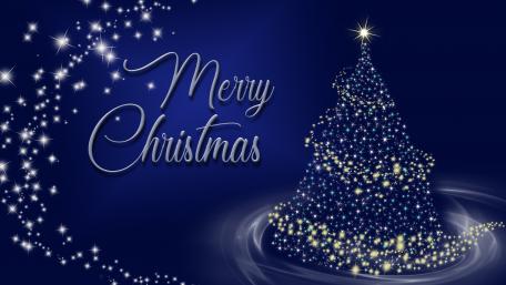 Sparkling Christmas Tree in a Starry Night Sky wallpaper