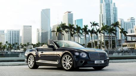 Sleek Convertible in Urban Paradise wallpaper