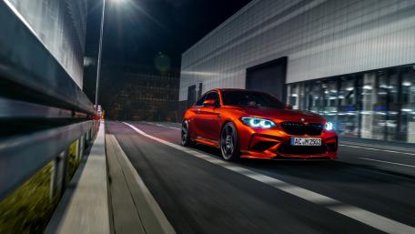 Sleek Luxury of a BMW at Night wallpaper