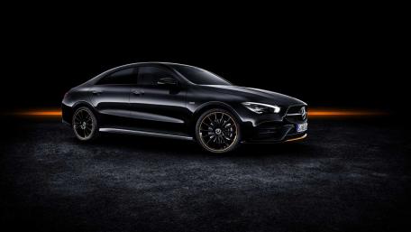 Sleek Black Luxury Car Wallpaper wallpaper