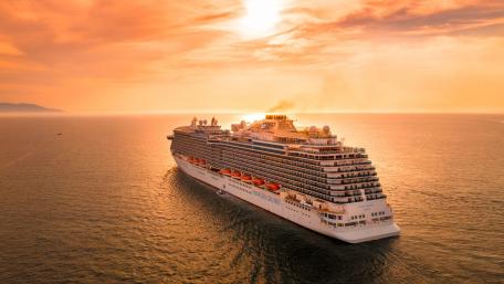 Majestic Cruise Ship Sailing at Sunset wallpaper