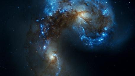 Cosmic Dance of Galaxies in Deep Space wallpaper