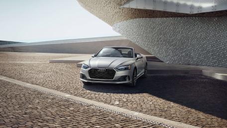 Sleek Audi Cabrio in Urban Landscape wallpaper