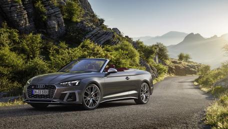 Sleek Audi Cabriolet on a Scenic Road wallpaper