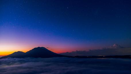 Majestic Mountain Under a Starry Sky wallpaper