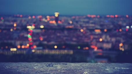 Evening Cityscape with Distant Lights wallpaper